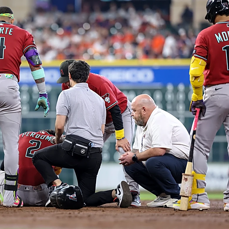 Diamondbacks' Perdomo exits after being hit on helmet by line drive