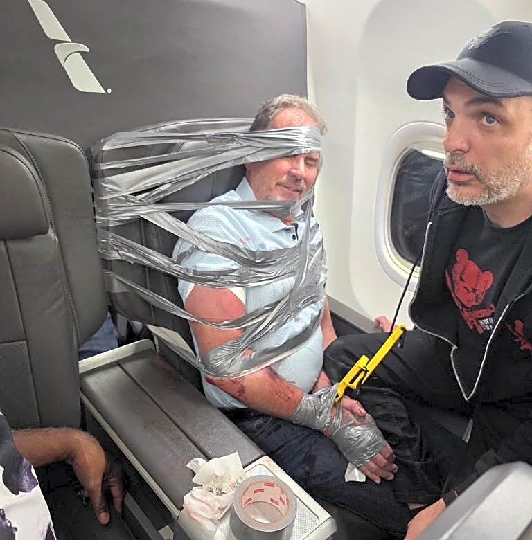 Duct-taped man belligerent on Labor Day weekend flight, passenger says