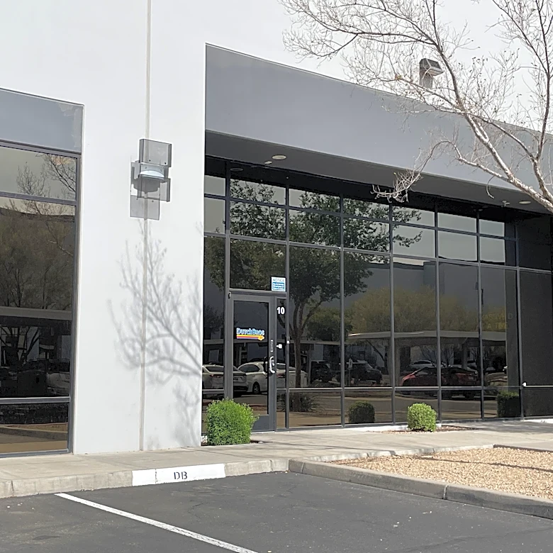 Which company is expanding its office space near Loop 101 in Peoria?