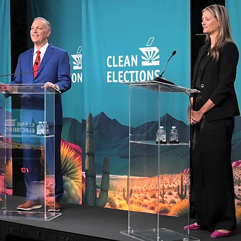 Hourihan attacks Biggs as both target absent Hobbs in governor debate