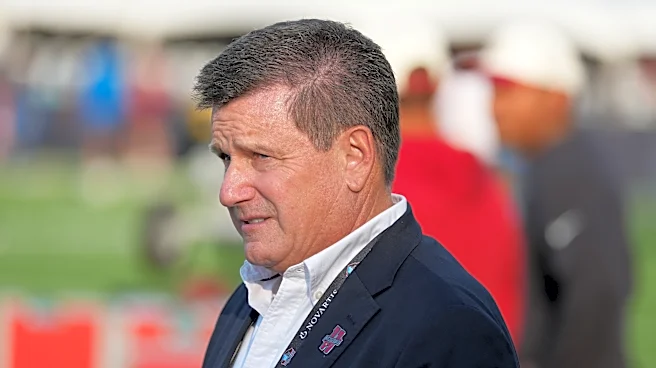 Dispute involving Arizona Cardinals owner and ex-assistant drags on