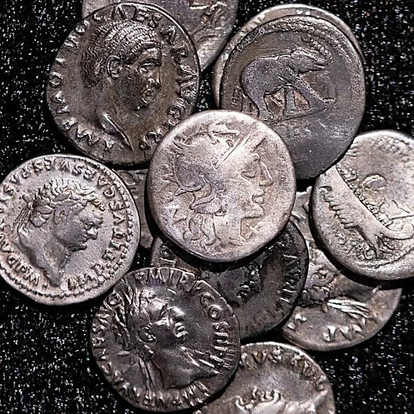 Amateur Archaeologist With a Metal Detector Finds 934 Roman Silver Coins in a Field in Western Germany