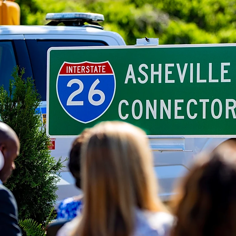Blasting along I-26 in North Asheville to 'slow roll' traffic Oct. 1