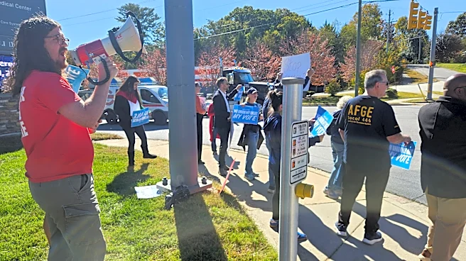 Asheville's federal employees rally against Trump's workforce approach