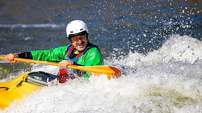 Woodfin opens new whitewater wave on French Broad