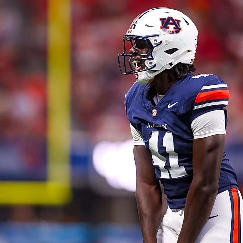 How many more games does ESPN FPI predict Auburn to win?