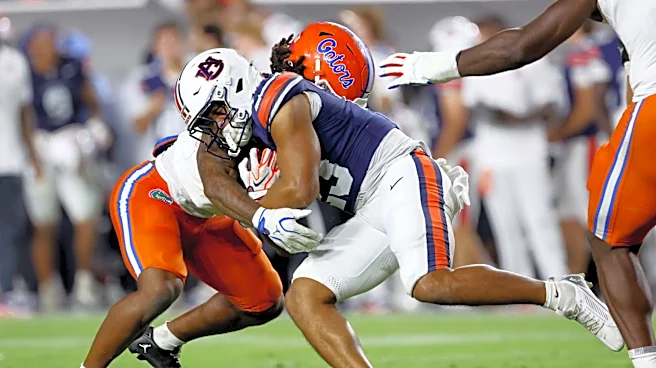 How many more games will Auburn win this season according to ESPN's FPI?