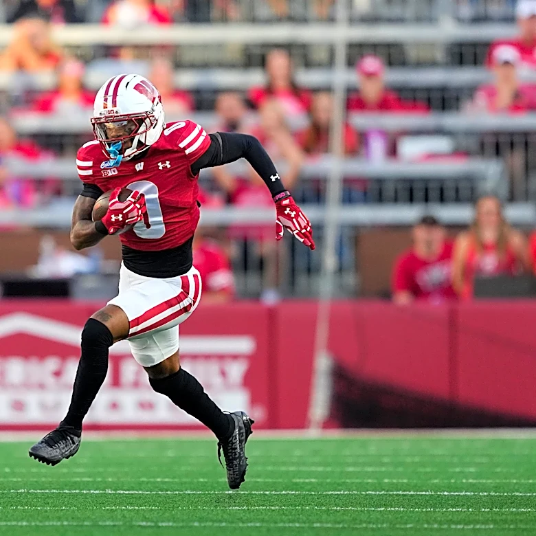 Wisconsin’s Tyrell Henry breaks single-game reception record in Week 3