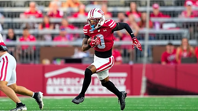 Wisconsin’s Tyrell Henry breaks single-game reception record in Week 3
