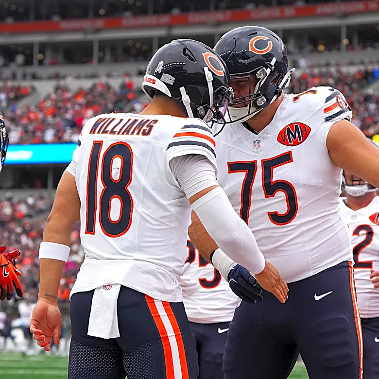 Caleb Williams reacts to Bears LT Ozzy Trapilo's return to practice