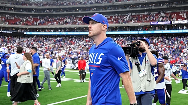 Bills, Joe Brady celebrations walking off field at Reliant Stadium after Texans win