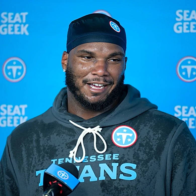 How did former Broncos DE John Franklin-Myers do in his first Titans game?
