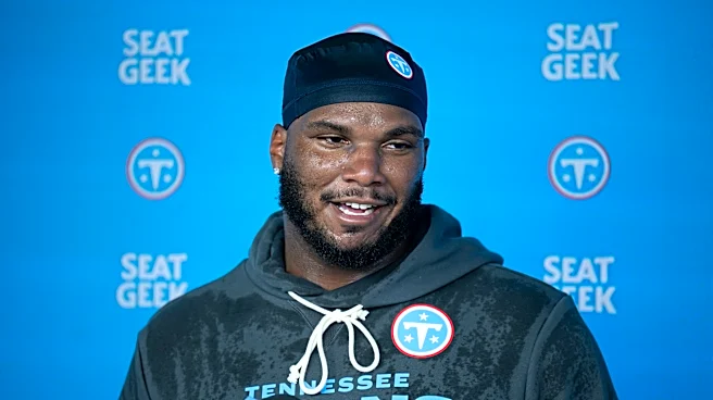 How did former Broncos DE John Franklin-Myers do in his first Titans game?