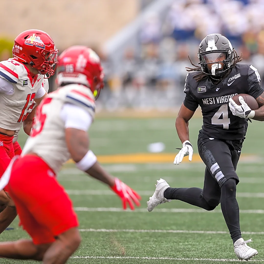 Big 12 football rushing yardage leaders include a QB near the top