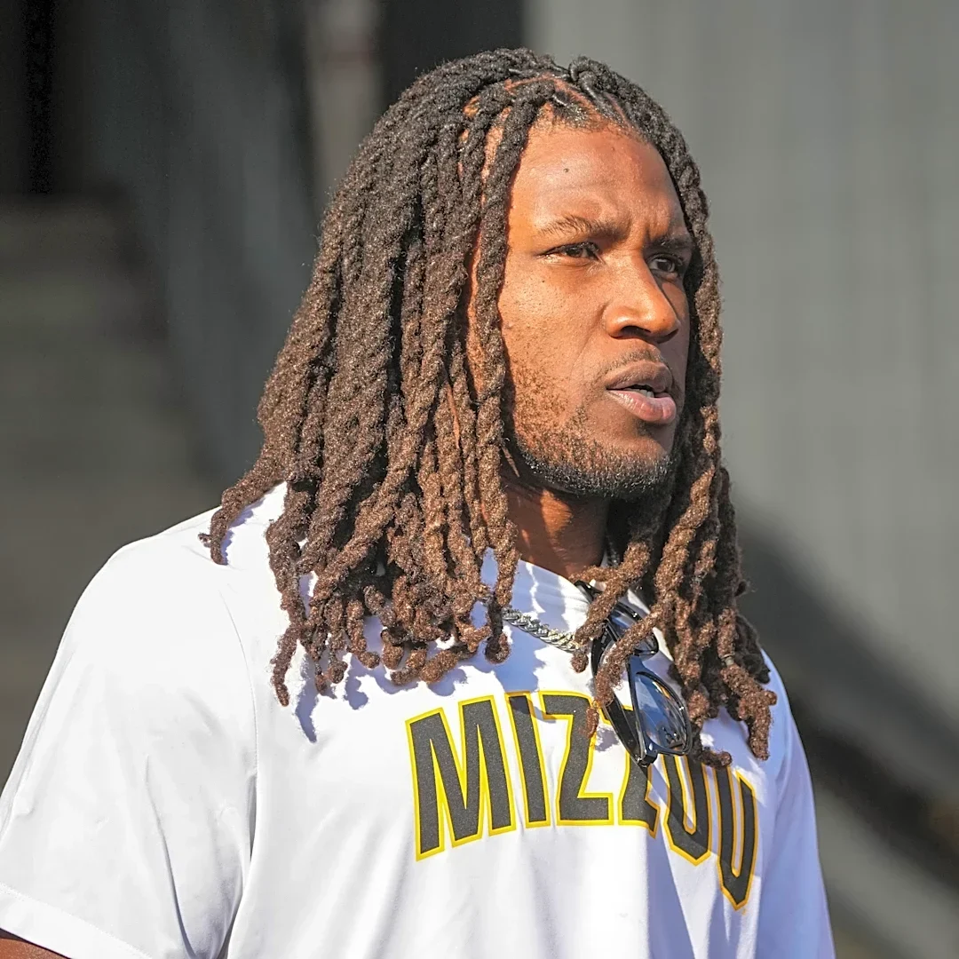 Chiefs players spent last weekend supporting college football programs