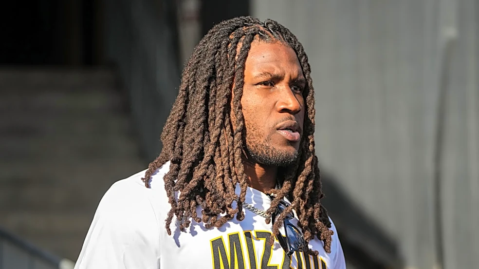 Chiefs players spent last weekend supporting college football programs