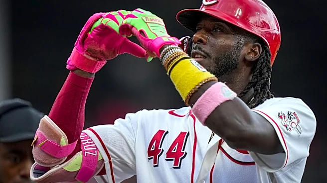 The Reds, Cardinals split their doubleheader. Here's how