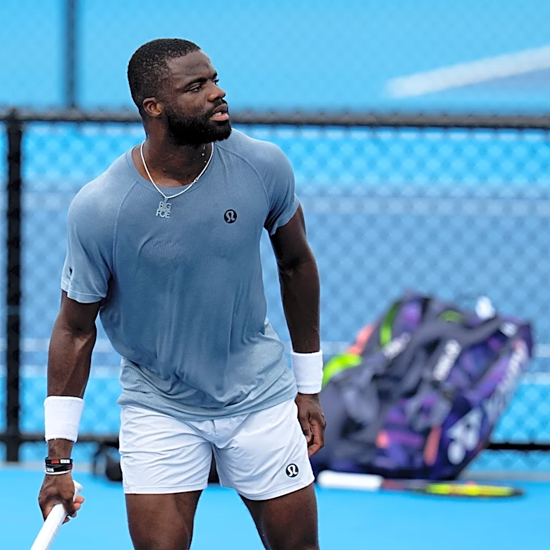 Learner Tien jokes to Francis Tiafoe, 'Your wrist is not injured, bro'