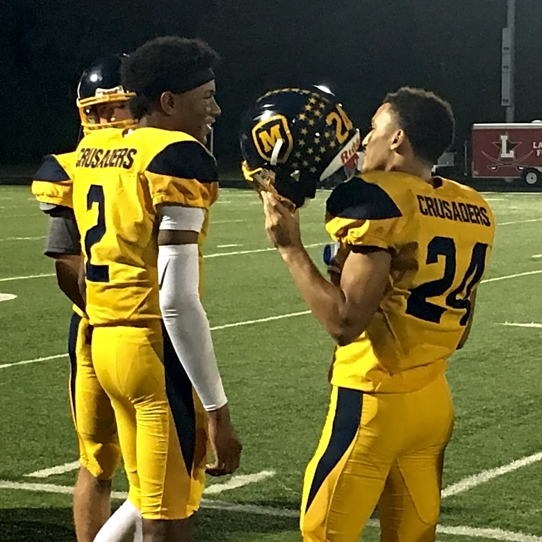Miles McBride brings NBA championship trophy to Moeller football game