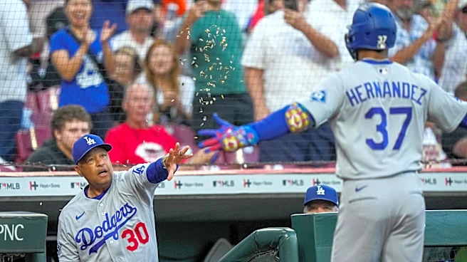 Dodgers clinch 14th straight playoff berth with win over Reds