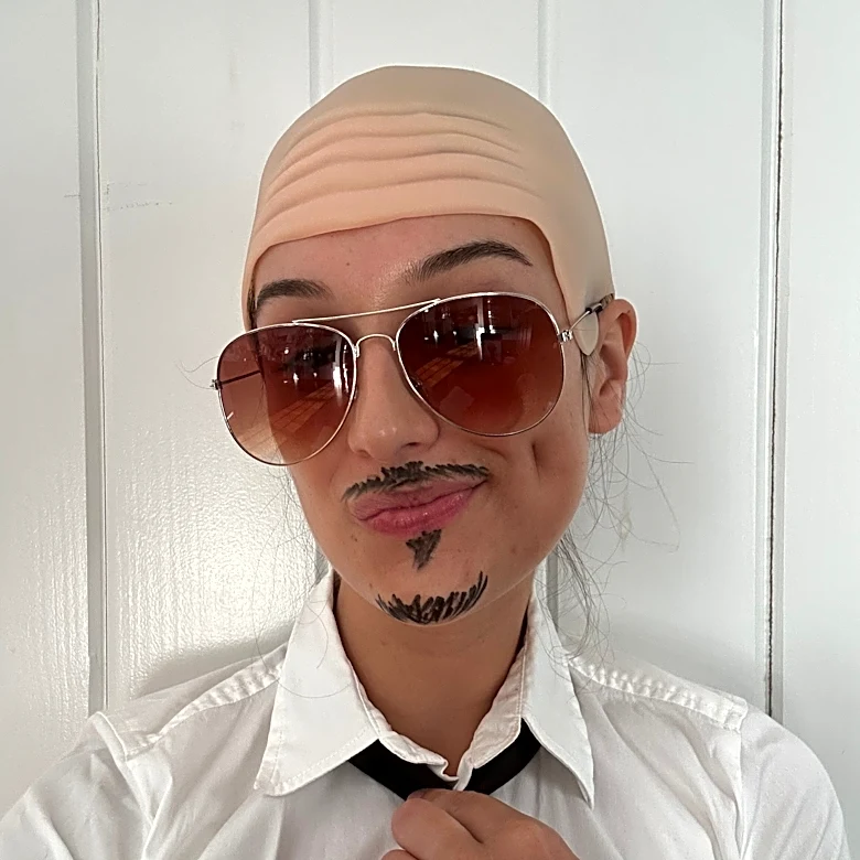 I wore a bald cap to a Pitbull concert. Here's what happened