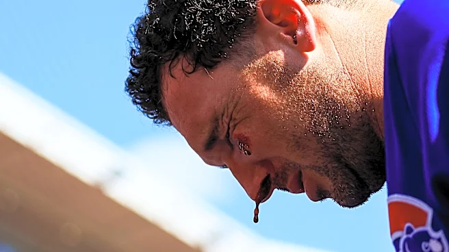 Cubs' Alex Bregman struck in face by line drive, exits game vs. Reds