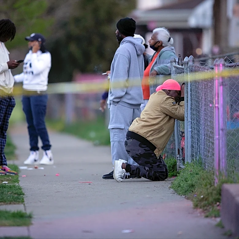 Prosecutor says gunmen on trial turned a 'girl fight into a gunfight'