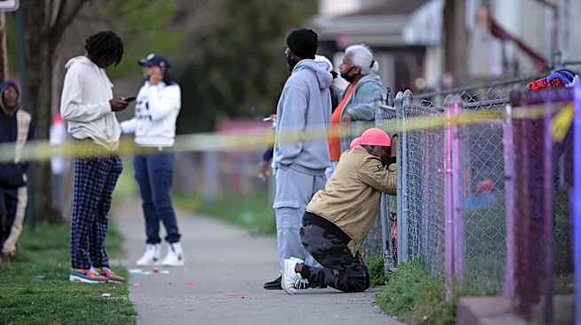 Prosecutor says gunmen on trial turned a 'girl fight into a gunfight'