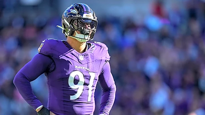 'Let's talk over here.' Trey Hendrickson has private chat with Burrow