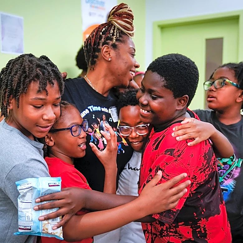A front-porch idea grew into a hub for hundreds of Detroit kids