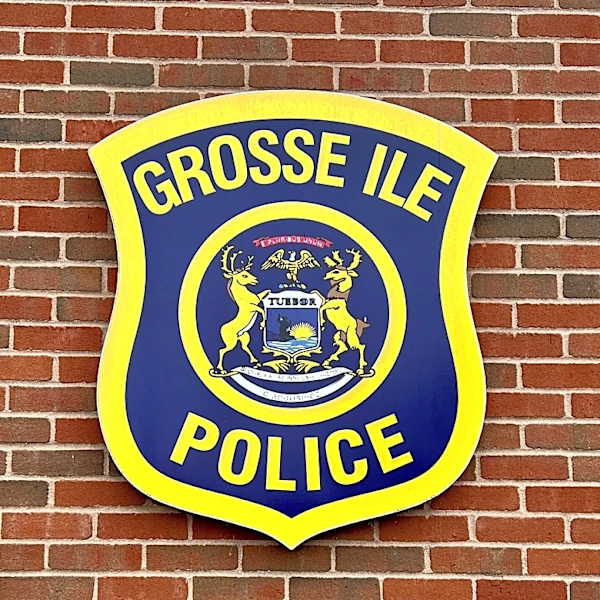 Lawsuit: Grosse Ile police official threatened witness to help a friend