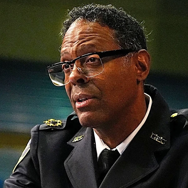 Detroit chief asked activist to remove photos of Sheffield kissing man