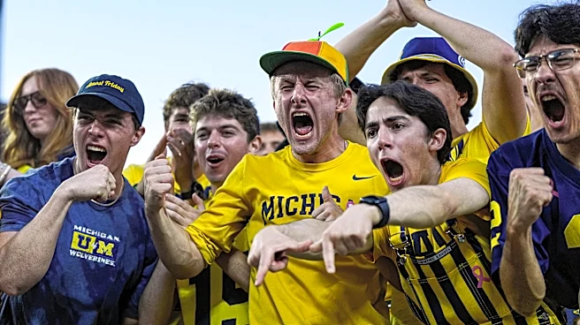 Michigan fans get second lease on life after Hail Mary: 'Man I love football'