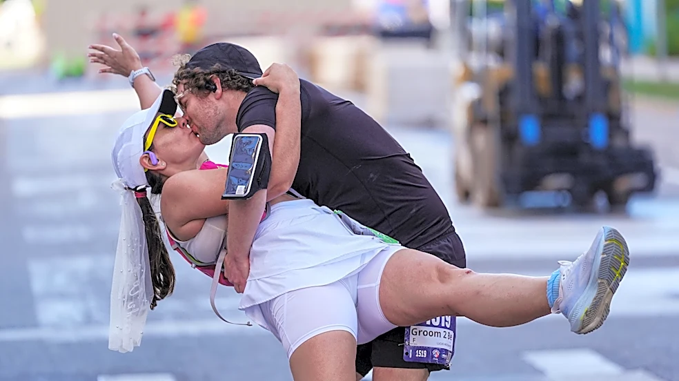 Canton couple turns slow marathon run into happy finish-line wedding