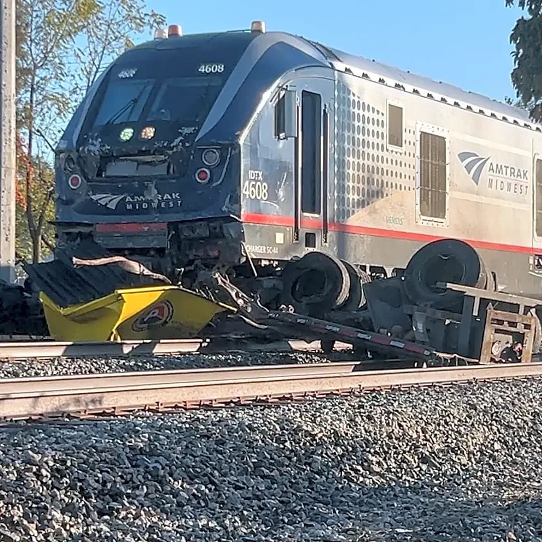 Police: Garbage truck driver went around lowered gates in Amtrak crash