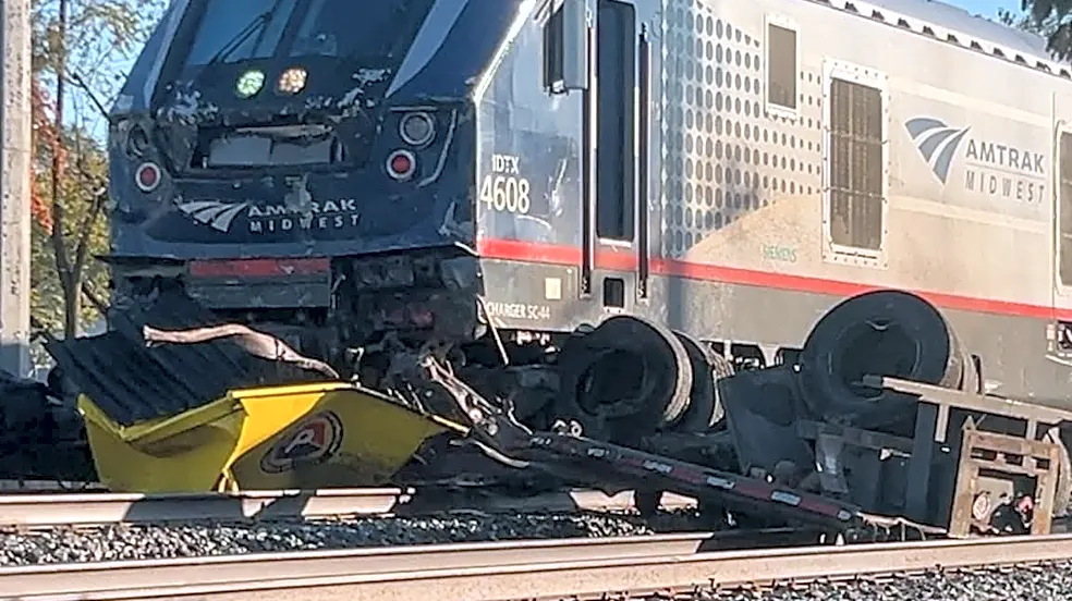 Police: Garbage truck driver went around lowered gates in Amtrak crash