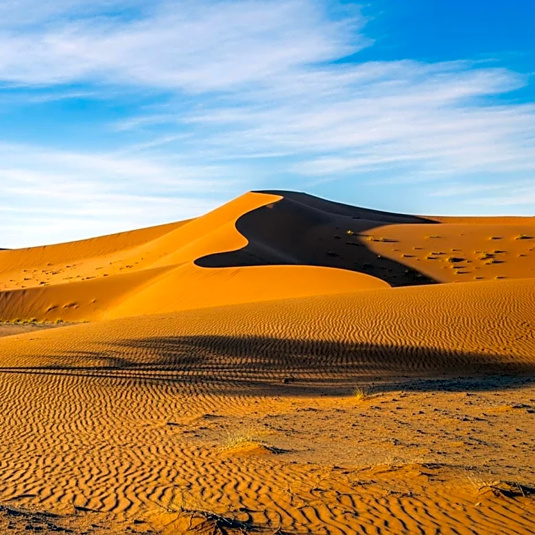 Explore Namibia’s Vibrant Surf Culture, Colonial History, and Record-Breaking Canyons