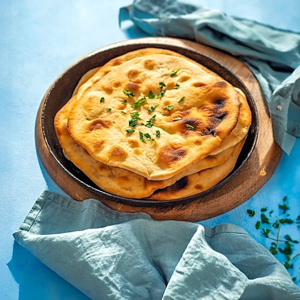 The Centuries-Old Story Behind Naan Bread