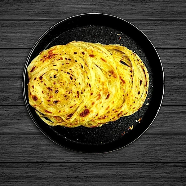 How Paratha Gets Its Signature Flaky, Layered Texture