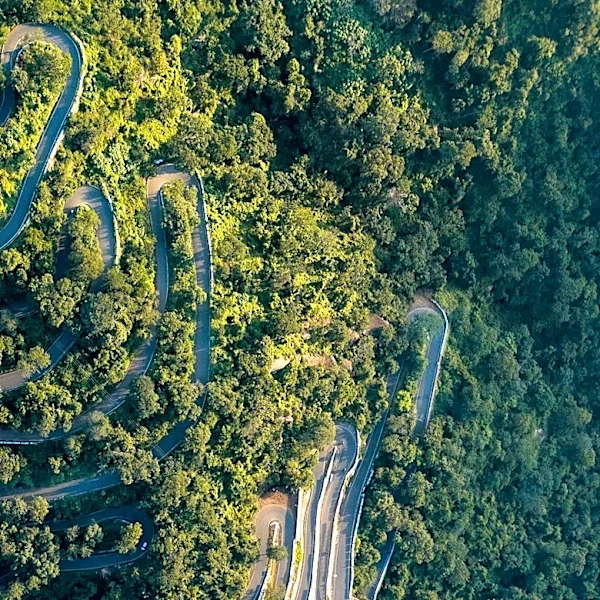 Why Mountain Roads Use Hairpin Turns Instead of Climbing Straight Up