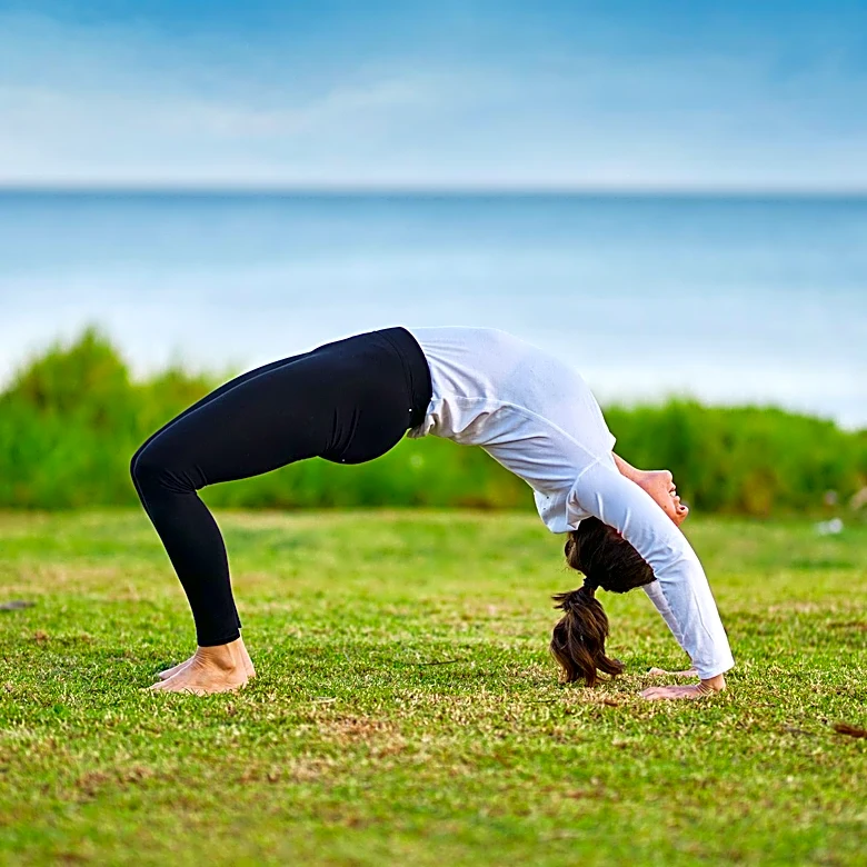 Why Wheel Pose Is One of Yoga's Most Challenging Backbends