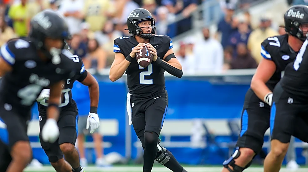 What is Duke's all-time record against UNC on the football field?