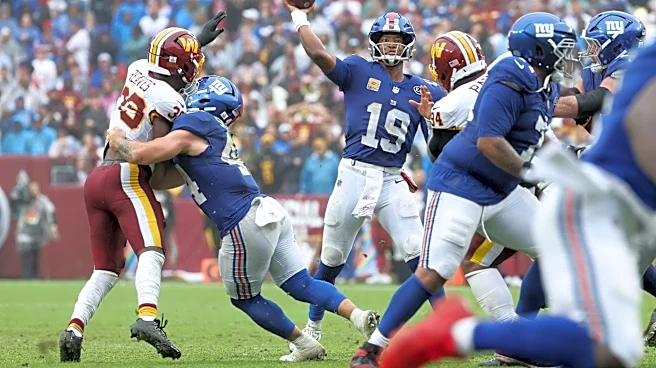Eagles stay in NFC East race as Giants, Commanders finish in a tie