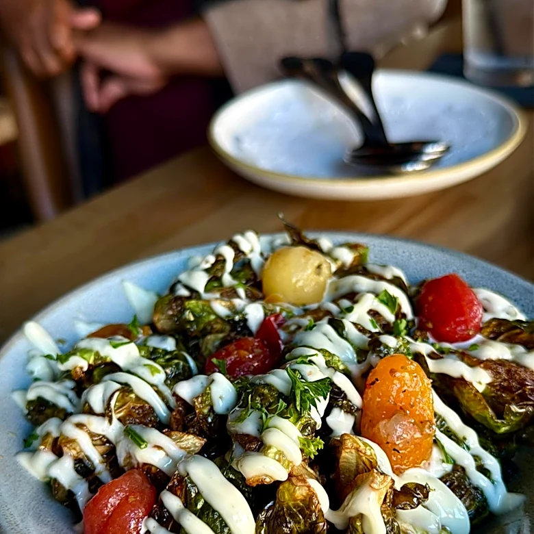 Even the Brussels Sprouts Aren’t Boring at This Vibrant D.C. Caribbean Restaurant