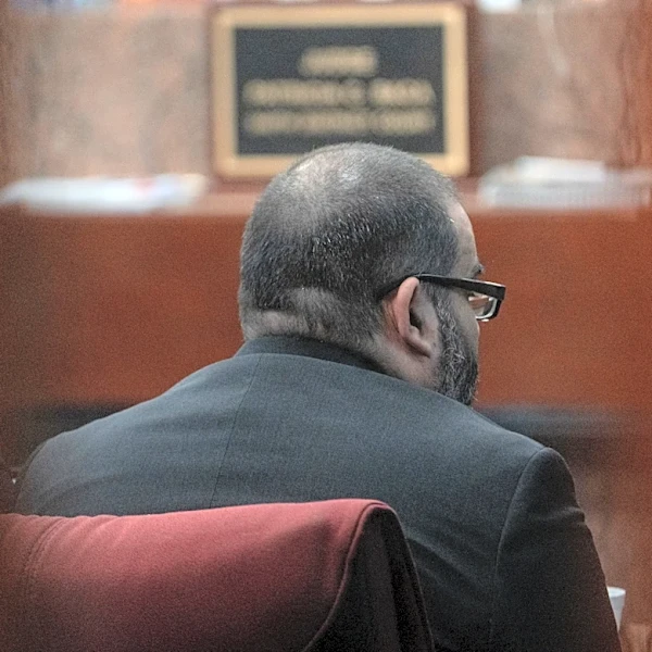 Jury hears grisly details of Christmas murders as suspect faces life