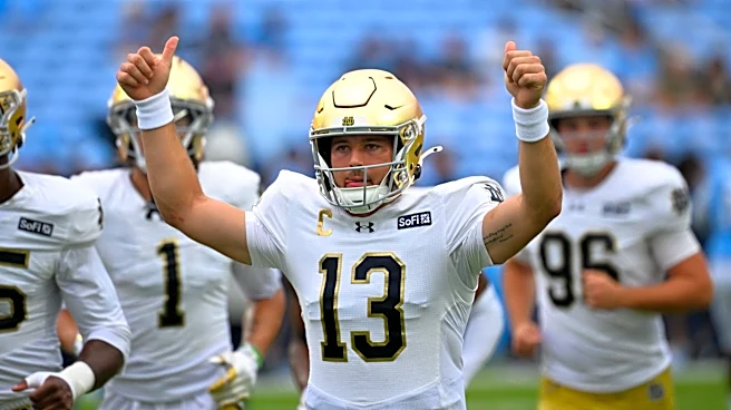 CJ Carr shares ‘1-of-1’ trading card with Notre Dame great Joe Montana
