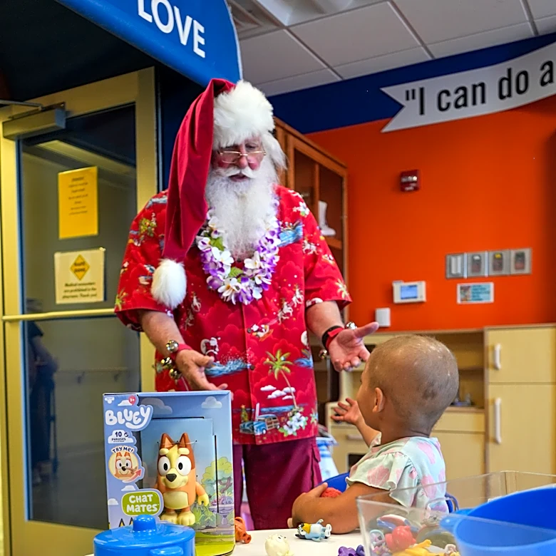 Santa in shorts! 'Christmas in July' brings joy to Wolfson patients