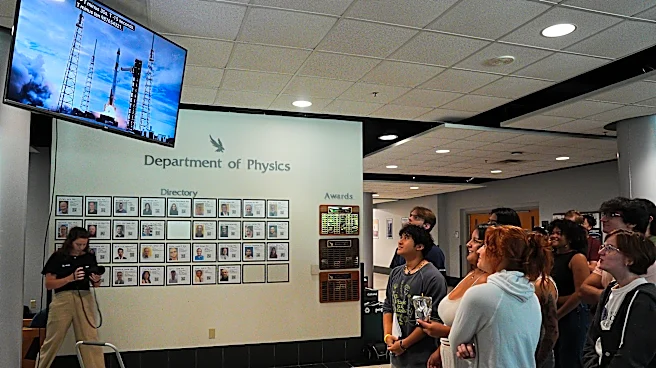 At UNF, fans watch Osprey pilot Dragon to International Space Station