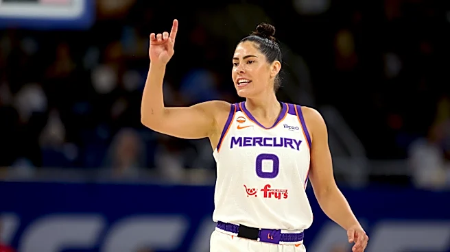 Kelsey Plum surprised Dream coach with a mid-fall bear hug