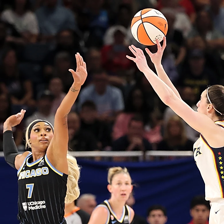 Caitlin Clark waves off DiJonai Carrington after bump during Fever-Sky